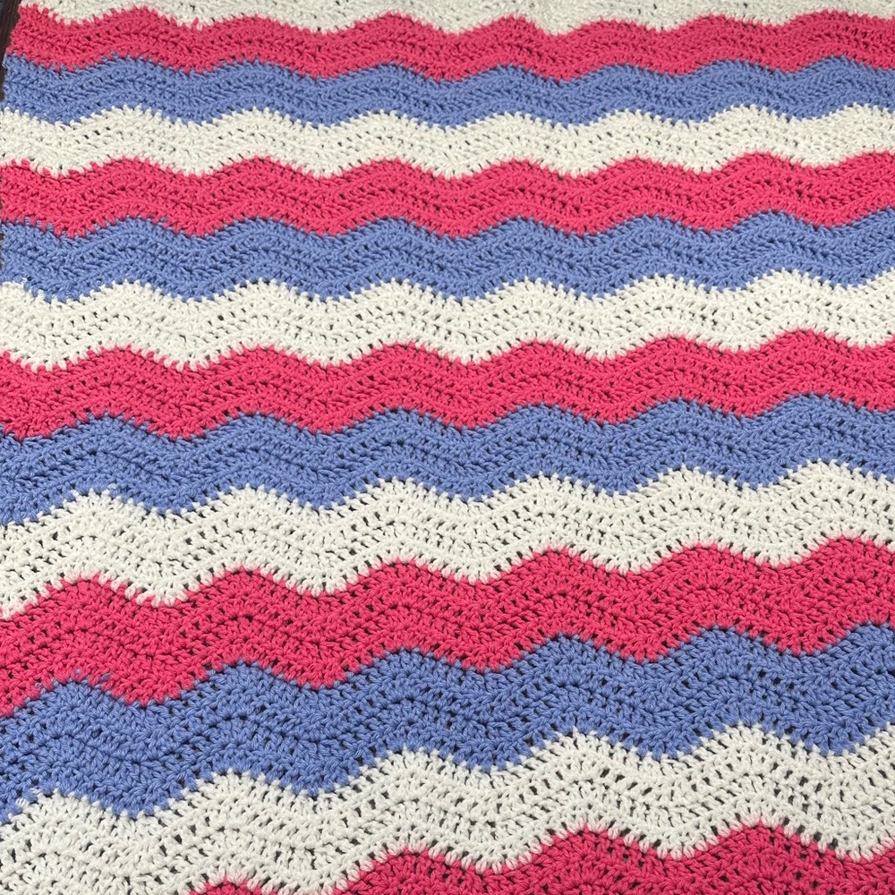 Hand crafted, crib, blanket, or lapgahn.